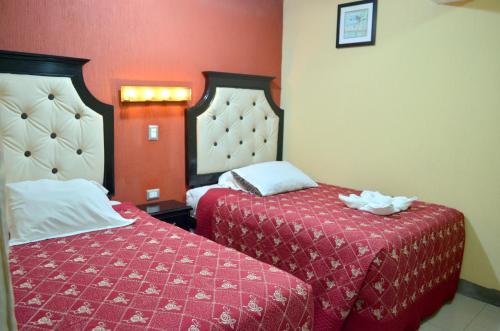 Postel nebo postele na pokoji v ubytování Hotel y Restaurante Castillo de los Altos