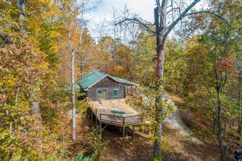an aerial view of a cabin in the woods at Happy Top Hideaway in Bryson City