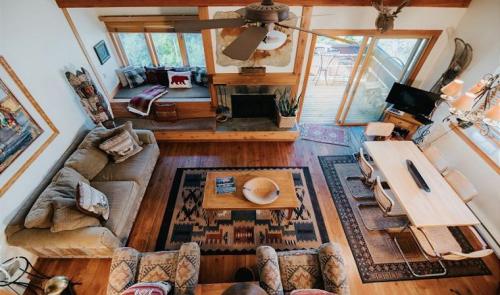 a living room with a couch and a table at 1123 Indian Paintbrush in Wilson