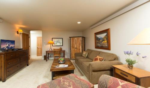a living room with a couch and a table at 2502 Pitchfork in Jackson