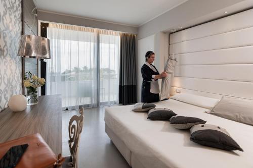 Postel nebo postele na pokoji v ubytování Mec Paestum Hotel
