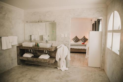 Et badeværelse på Giardino Boutique Hotel