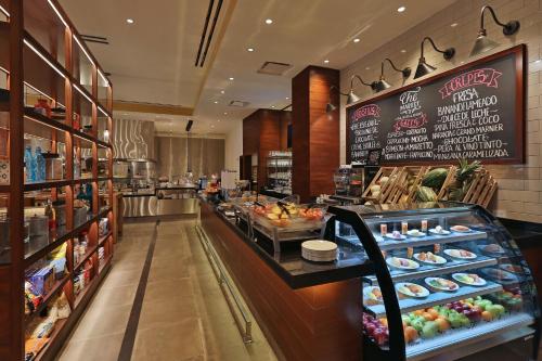 a grocery store with a counter with food on display at InterContinental Real Santo Domingo by IHG in Santo Domingo