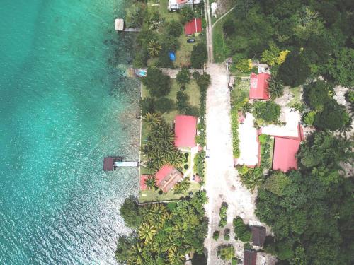 an aerial view of a resort next to the water at Coras Place Bacalar Lagoon front in Bacalar
