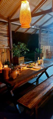 a wooden table with food on top of it at Ponta Poranga Jungle Lodge in Manaus