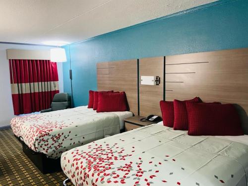 Postel nebo postele na pokoji v ubytování Jackson Motel
