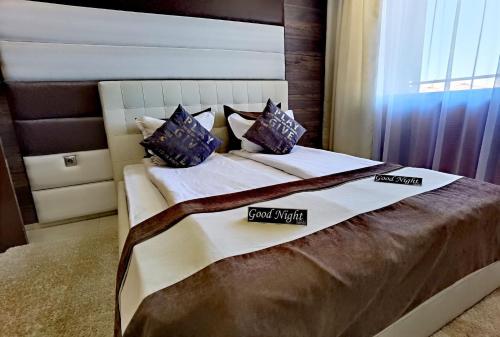 Postel nebo postele na pokoji v ubytování Hotel Acktion