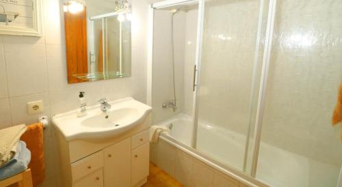a bathroom with a sink and a shower at 411 Finca Sa Costa ETV1976 by Mallorca Charme in Campos