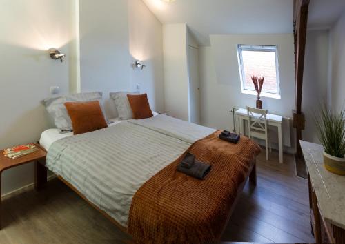 Posteľ alebo postele v izbe v ubytovaní inn Venlo Apartment