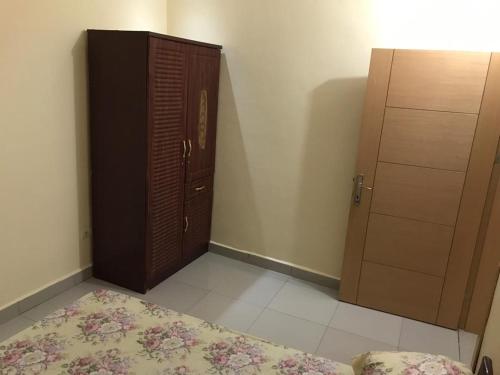 Postel nebo postele na pokoji v ubytování Immeuble SOUKO