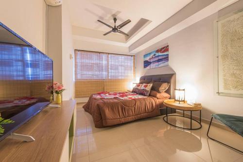 a large bedroom with a bed and a table at Ancient Loft House -Japan Theme KL Bukit Bintang in Kuala Lumpur