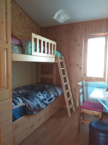 A bed or beds in a room at Nido di Nico