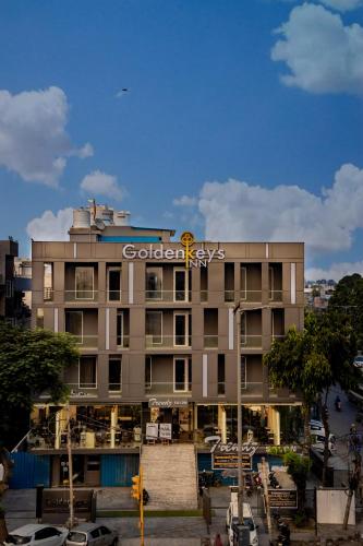 a building with a sign on the side of it at GoldenKeys Inn in New Delhi