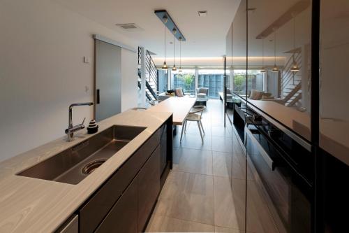 Köök või kööginurk majutusasutuses Condominium ISHITEI Furano