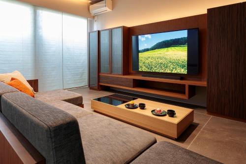 Televisyen dan/atau pusat hiburan di Condominium ISHITEI Furano