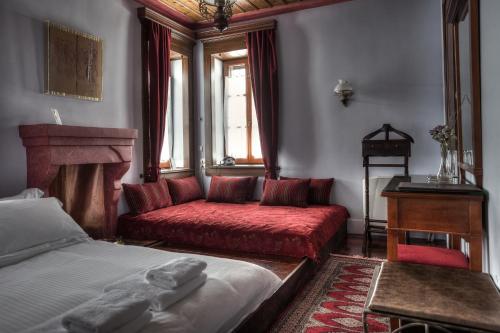 Cama o camas de una habitación en Nymfes Hotel
