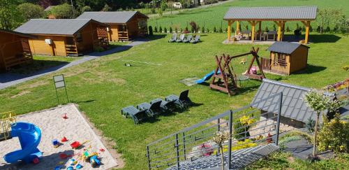 an aerial view of a park with a playground at DOMKI POD ZIELONYM WZGÓRZEM in Kudowa-Zdrój