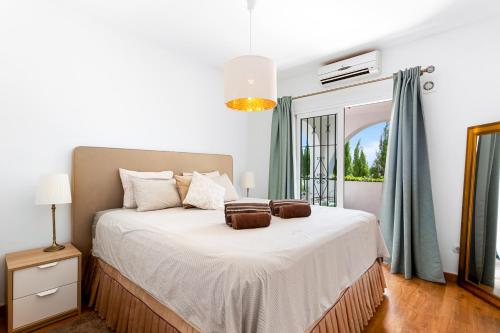 Ένα ή περισσότερα κρεβάτια σε δωμάτιο στο Villa Ophelia, Torreblanca