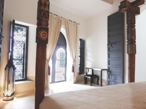 Postel nebo postele na pokoji v ubytování Riad Dar-K