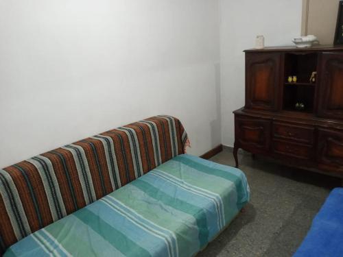 Łóżko lub łóżka w pokoju w obiekcie Rinconcito San Luis