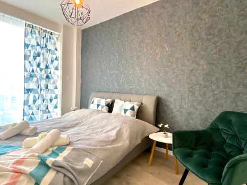 Postel nebo postele na pokoji v ubytování Apartment Malá Praha