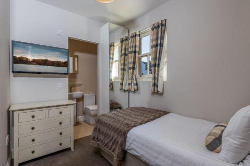 Brampton Holiday Homes - Beckside Apartment tesisinde bir oda