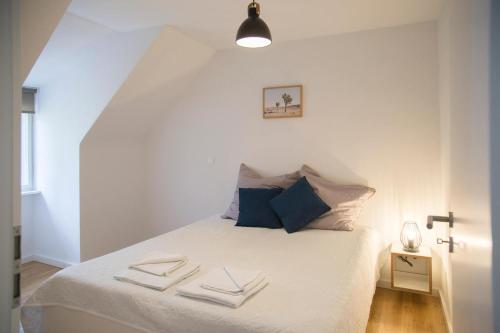 Säng eller sängar i ett rum på Madflats Hotel-Apartments S-Bahn Friedenau