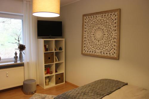 TV a/nebo společenská místnost v ubytování Ferienapartment Helling