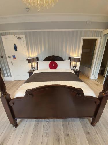 Katil atau katil-katil dalam bilik di Charnwood Regency Guest House