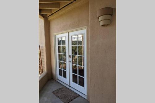 a door to a building with a window at Hillside 2/2 Subdivided Home w/ Pool and Views! in San Marcos