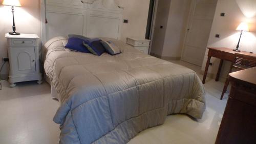 Katil atau katil-katil dalam bilik di B&B Al Dom