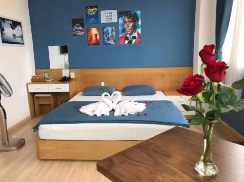 Chivas Dalat Hotel tesisinde bir odada yatak veya yataklar