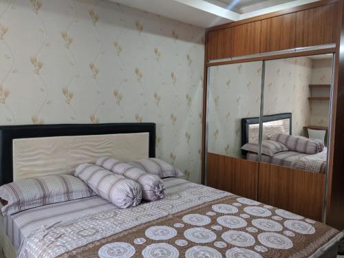 Кровать или кровати в номере Pinewood Apartment by Vial