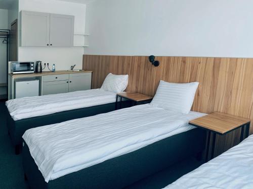 Una cama o camas en una habitación de Muontis