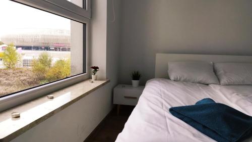 Postel nebo postele na pokoji v ubytování Dąbska 26 by Homeprime
