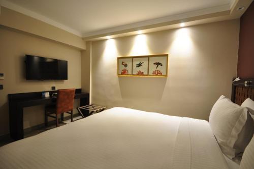 Resa Hotel Göcekにあるテレビまたはエンターテインメントセンター