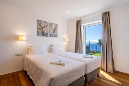 Ένα ή περισσότερα κρεβάτια σε δωμάτιο στο Villa Fauna - Nature & Tranquility - Heated pool optional