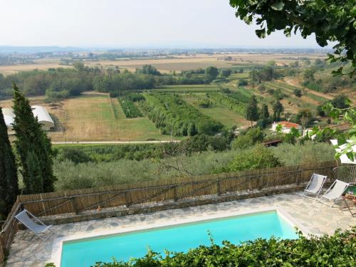 a pool in a villa with a view at Holiday Home Maestraccio by Interhome in Buti