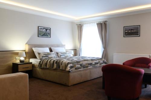 Ein Bett oder Betten in einem Zimmer der Unterkunft Vinařství U Kapličky