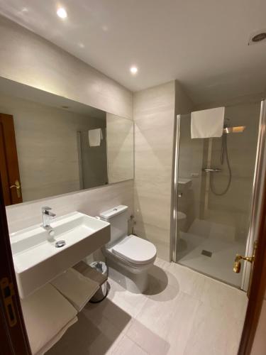 Kylpyhuone majoituspaikassa Apartamentos San Fermín
