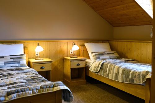 Ein Bett oder Betten in einem Zimmer der Unterkunft Vinařství U Kapličky