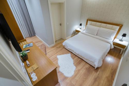 Postel nebo postele na pokoji v ubytování Villa Ester
