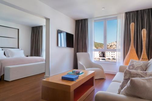 Postel nebo postele na pokoji v ubytování Adriana Hvar Spa Hotel