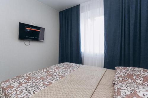 Кровать или кровати в номере Apart-hotel I. Sirko New Building 7 floor