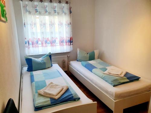 Postel nebo postele na pokoji v ubytování Drei Zimmer Apartment am Rhein