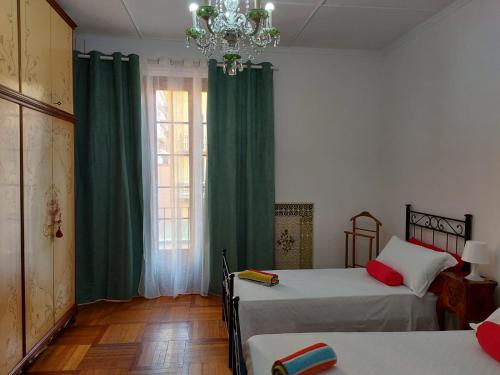 Llit o llits en una habitació de Bnbook-Villa Molinari
