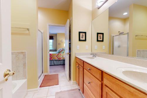 a bathroom with a large sink and a shower at Bear Trap Dunes - 58D October Glory in Ocean View