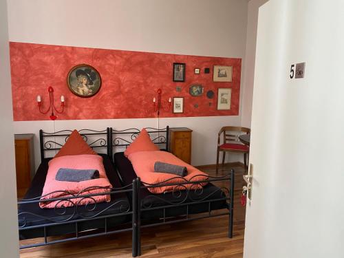 Ein Bett oder Betten in einem Zimmer der Unterkunft Pension Jeske Heidelberg