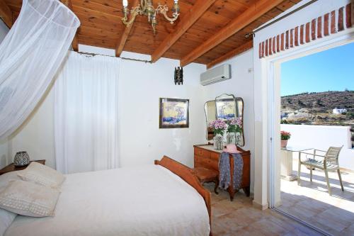 Llit o llits en una habitació de Villa Oasis