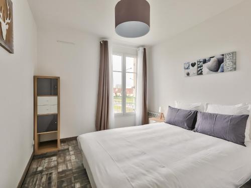 Ένα ή περισσότερα κρεβάτια σε δωμάτιο στο 123home-Le park side